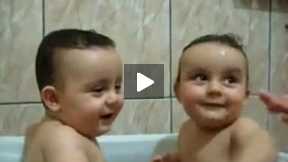 Twins Brothers Enjoying Bath Time