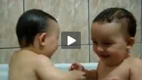 Twins Brothers Enjoying Bath Time