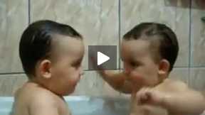 Twins Brothers Enjoying Bath Time